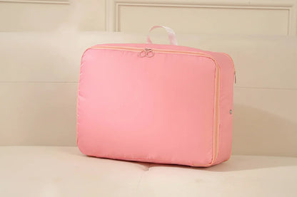 Packly™ - Compresses Bulky Linens for Neat Storage